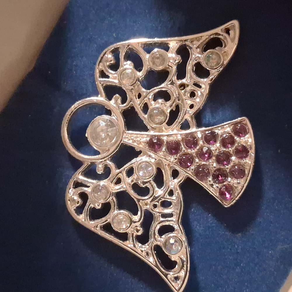 Avon Silver Angel Brooch Lapel Pin with Purple Crystals Accents.